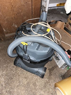 an image of a vacuum cleaner in a garage