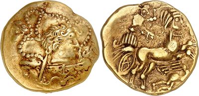 a gold coin with an image of a horse on it