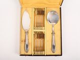 a box with a set of silverware inside of it