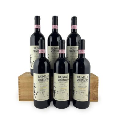three bottles of wine sitting on top of a wooden box