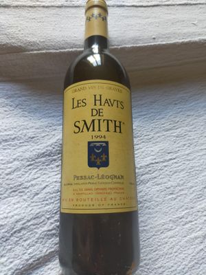 a bottle of wine that is sitting on a table
