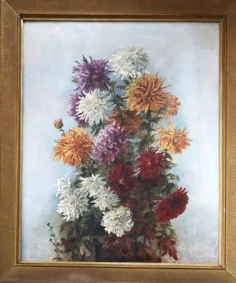 une photo d'un tableau de fleurs dans un cadre doré