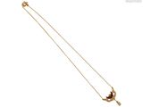 une image représentant un collier en or orné d'un oiseau