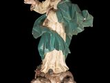 a statue of a woman holding a baby in her arms