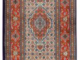 a red and blue rug on a white background