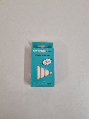a close up of a box of toothbrushes on a white surface