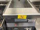 an image of a commercial fryer in a commercial kitchen
