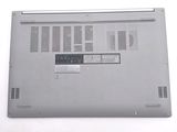 a laptop that is sitting on a white surface