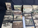 a lot of old postcards that are on the table