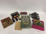beaucoup de jouets et de livres sur la table