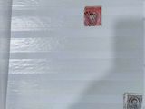 many different stamps on a piece of paper on a table