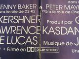 purple and white poster advertising a concert at a music venue