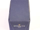an image of a small blue box with a logo on it