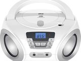 an image of a radio with a clock on top of it