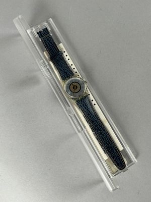 MONTRE SWATCH GK 145 Etat proche du neuf, dans une boîte.