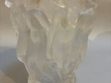 a glass vase that has a lot of frost on it