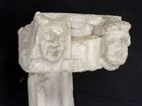 a close up of a stone pillar on a black background