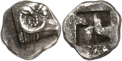 a silver coin with an image of a man and a woman on it