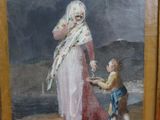 tableau représentant une femme tenant la main d'un enfant devant un tableau représentant un homme tenant la main d'un enfant