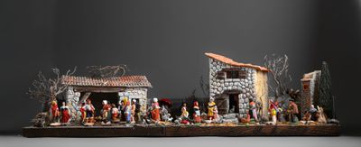 figurines d'une crèche dans une pièce sur fond noir