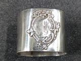 an image of a silver ring with a woman ' s face on it