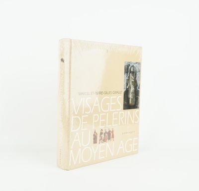 the book is sitting on a white surface with a white background