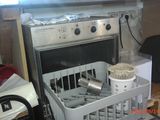 an image of a kitchen with a dishwasher and a stove