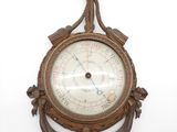 a clock that is hanging on the wall on the wall