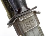 a close up of a knife that is on a piece of cloth