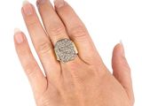 an image of a woman ' s hand with a diamond ring on it