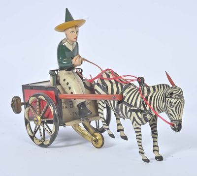 a figurine of a man riding in a horse drawn carriage with a zebra