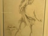 framed drawing of a man with a dog in a room
