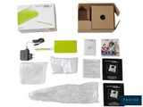 a box with a camera and other items inside of it