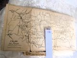a map on a table with a piece of paper on top of it