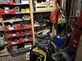 a room with a lot of items and a vacuum