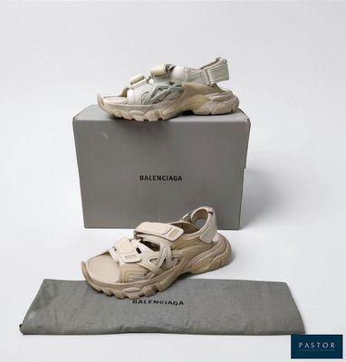 the shoes are on the box and ready to be put into the bag