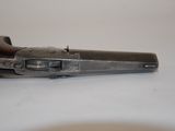 a gun that is sitting on a table