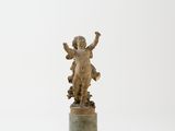 an antique statue of a child on a pedestal on a white background