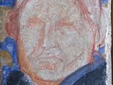 un tableau représentant un homme accroché au mur