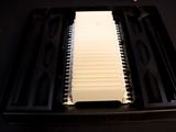 a piano that is sitting on a black table