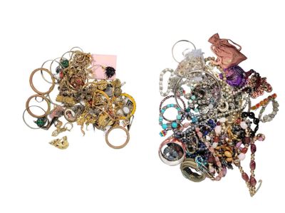 two pieces of jewelry that are sitting on top of each other