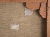a close up of a piece of fabric on a piece of wood