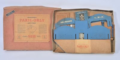 a cardboard box with a picture of a building inside of it