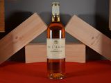 a bottle of wine that is sitting on a table