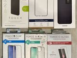 several boxes of various cell phones are sitting on a table