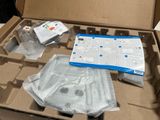 a cardboard box with a bunch of items inside of it