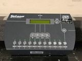 une image montrant un gros plan d'un appareil électronique posé sur un comptoir