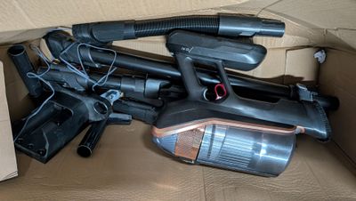 a box with a bunch of guns inside of it