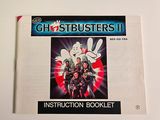 the ghostbusters ii instruction booklet is displayed on a table