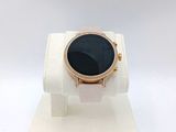 an image of a watch with a black face on a white display stand